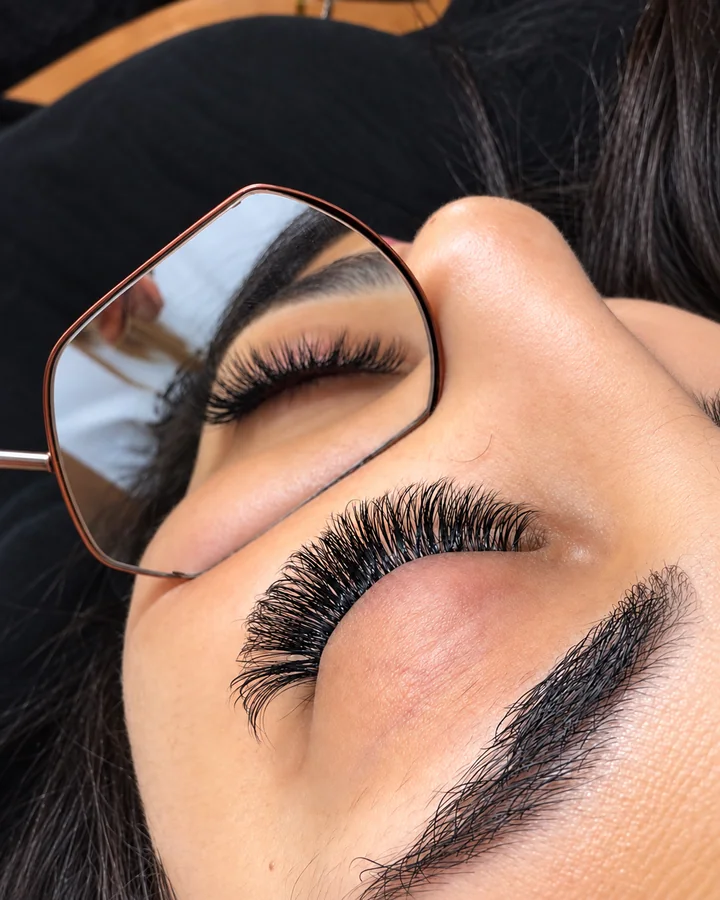 Lash extensions with a mirror reflection at Dina Beauty Center